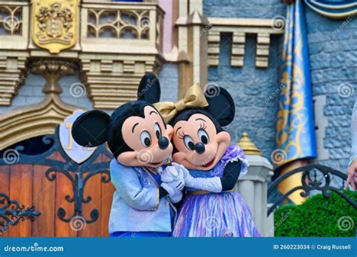 Disney fans are in tears and say 'love doesn't exist' as Mickey and Minnie Mouse break up after 95 i