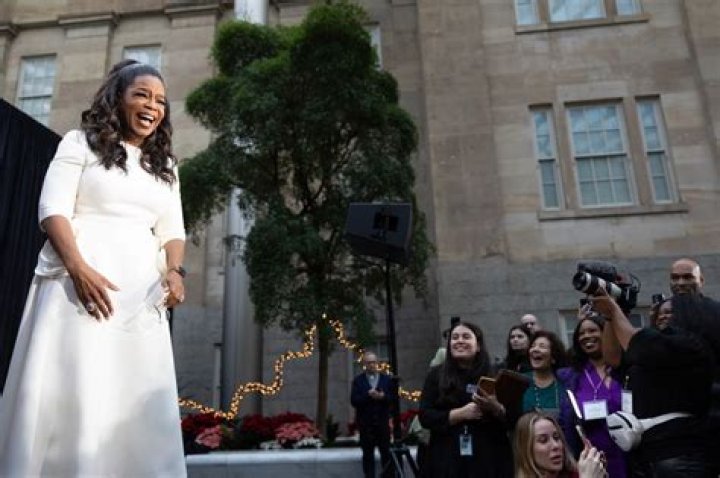 Oprah Winfrey, 69, models fitted dress after breaking silence about weight loss |