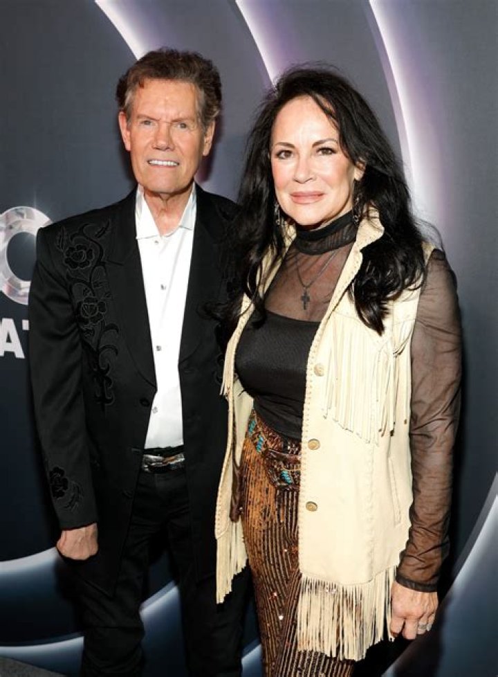 Uncover The Age Of Randy Travis' Wife: Unveiling A Mystery!