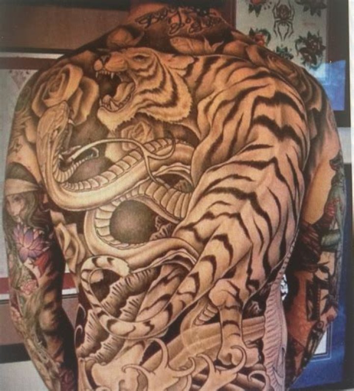 Who is Kevin Michael Brophy? Cardi B back tattoo trial